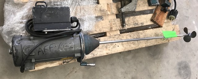 Used 1 HP Clamp-On Mixer. Has Baldor 1 HP, 90 volt, 1750 RPM with Lesson adjustable speed motor.  Stainless Steel shaft ~2'6
